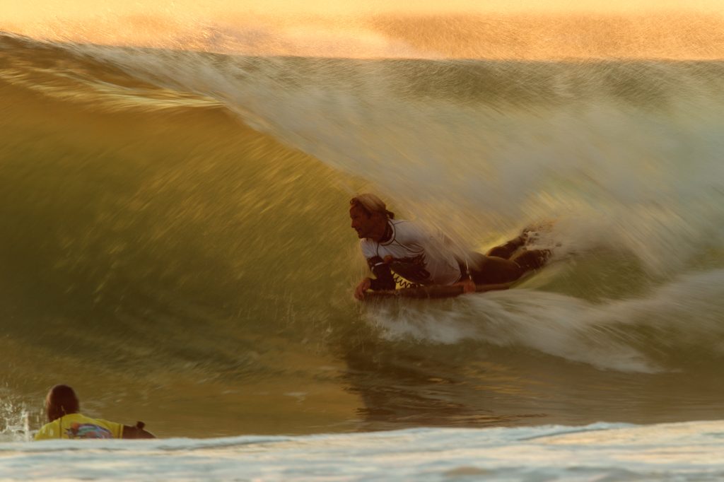 Hankus Loubser glides in the golden hour at Llandudno. Photo: Grag Chapman